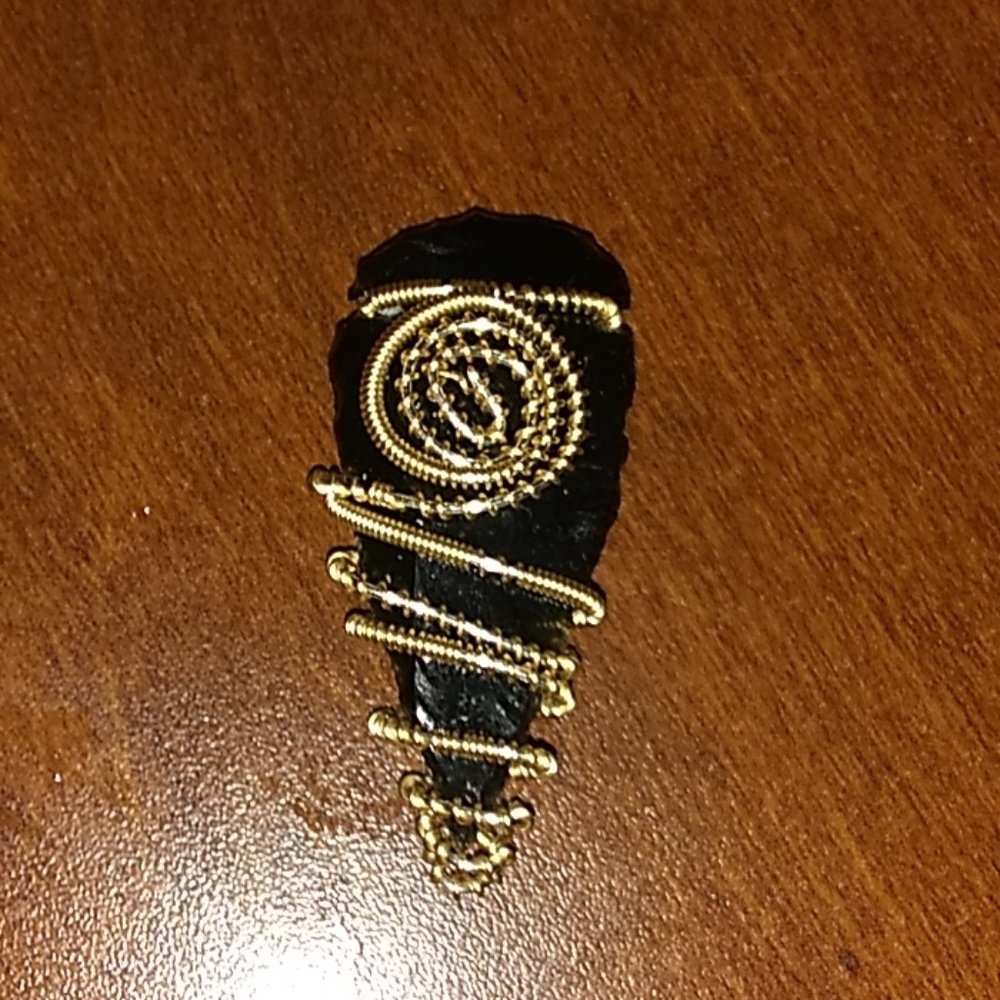 Lucky charm obsidian wrapped in gold and silver